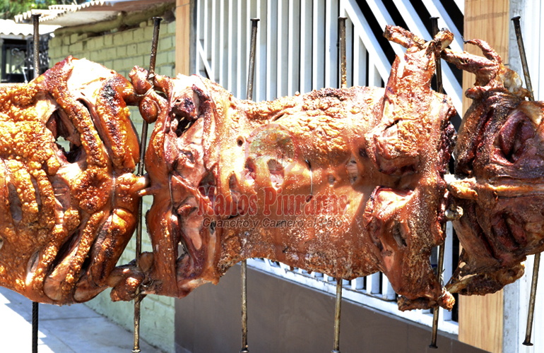 chancho y carnero al palo