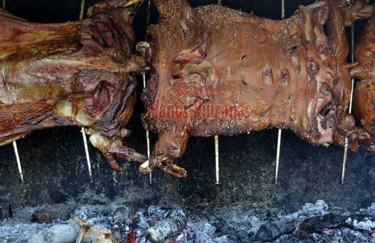 chancho y carnero al palo