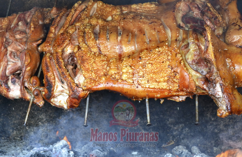 chancho y carnero al palo